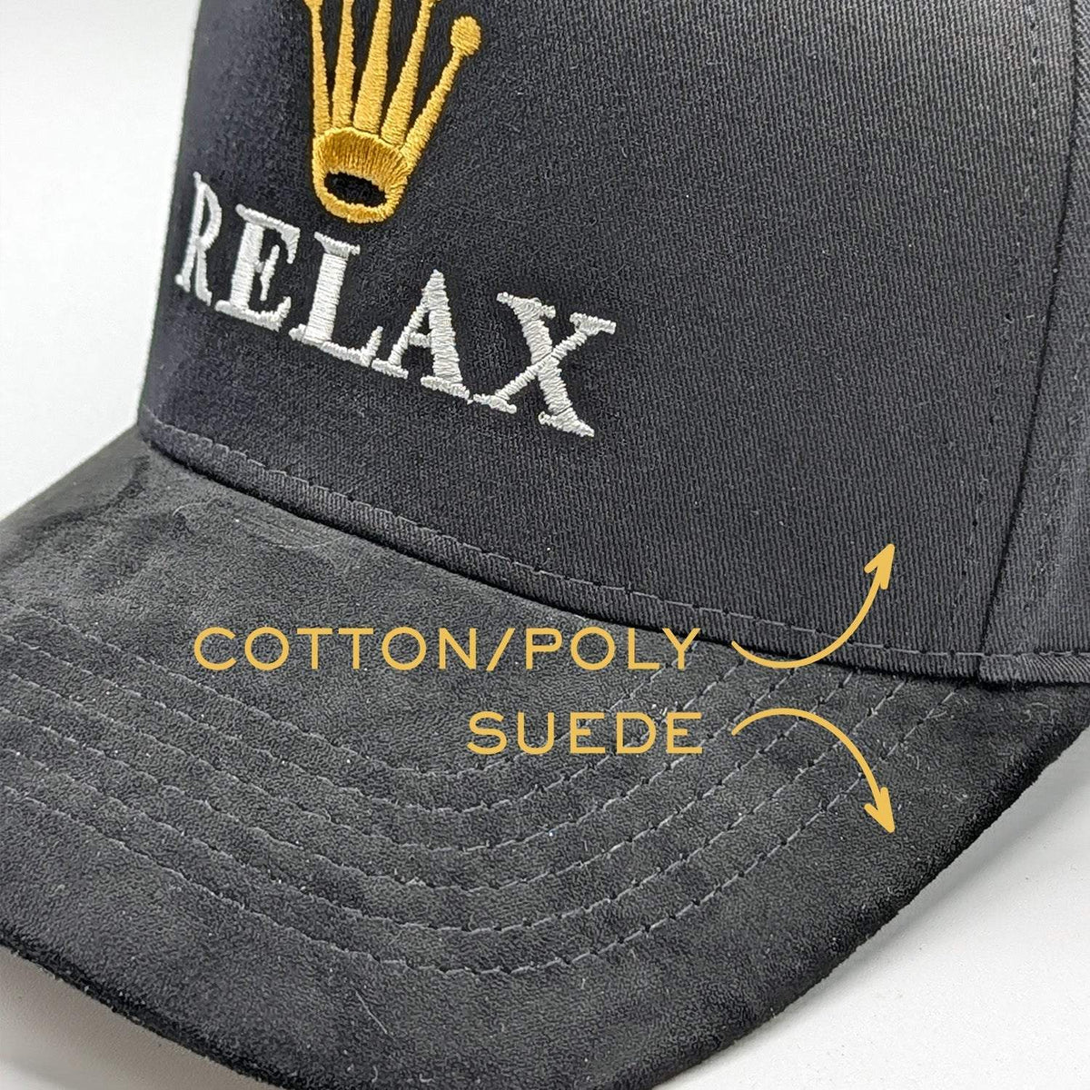 Relax - Premium Suede Snapback Hat in black with a cotton-poly crown, suede brim, and embroidered white lettering and gold crown