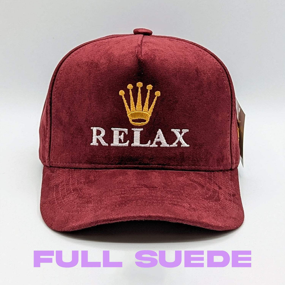 Relax - Premium Suede Snapback Hat in burgundy suede with white RELAX lettering, gold crown embroidery and curved brim