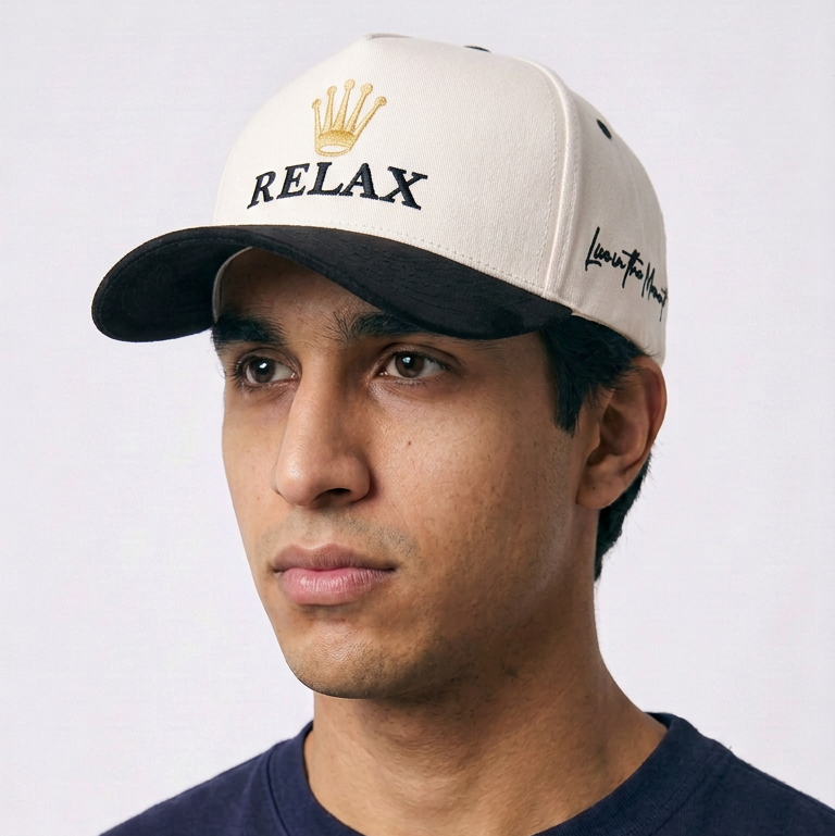 Relax - Premium Suede Snapback Hat in natural and black with embroidered crown emblem and lettering, dark brim