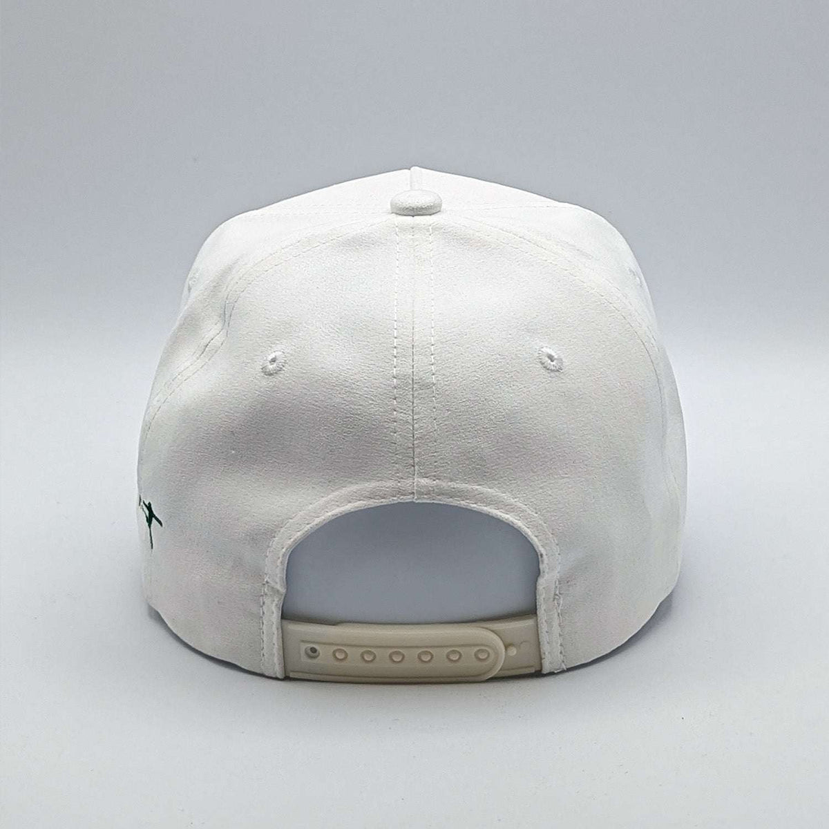 Relax - Premium Suede Snapback Hat with a white fabric crown, adjustable plastic snapback closure, and small green side embroidery