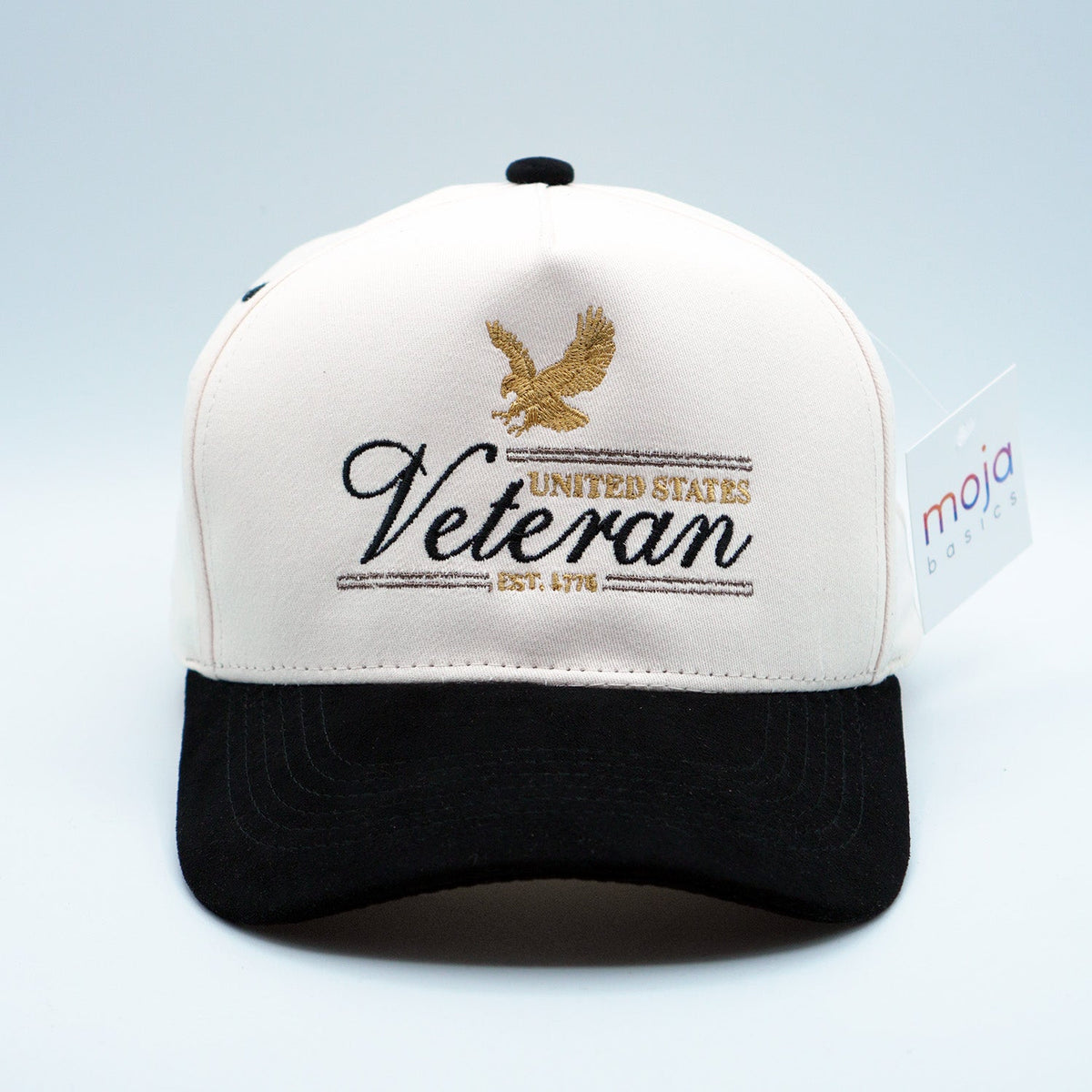 U.S. VETERAN five-panel snapback hat with a white embroidered front, gold eagle crest, and black curved brim.