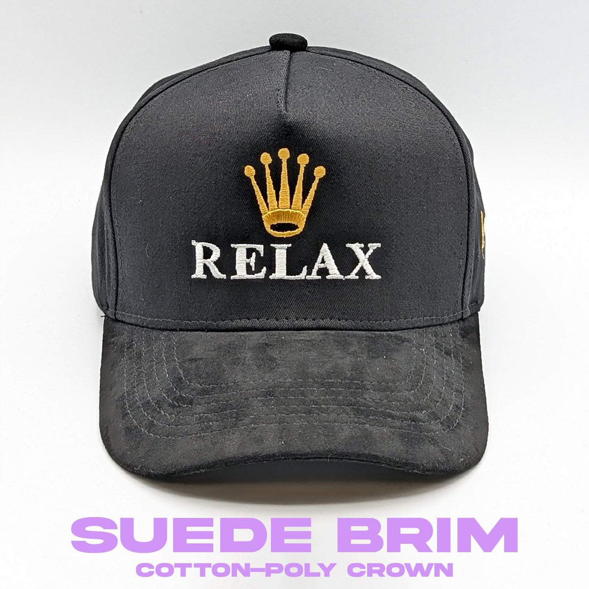 Relax - Premium Suede Snapback Hat with a black cotton-poly crown, textured dark suede brim, and embroidered gold crown and white lettering