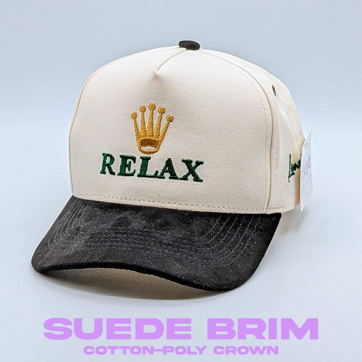 Relax - Premium Suede Snapback Hat with an off-white cotton-poly crown, black suede brim, and embroidered green lettering